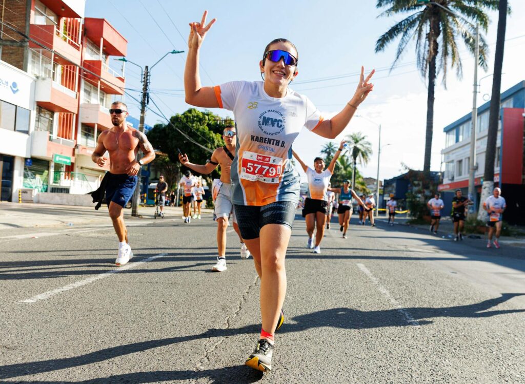 Energetic runners participating in a city marathon, showcasing enthusiasm and sportsmanship.